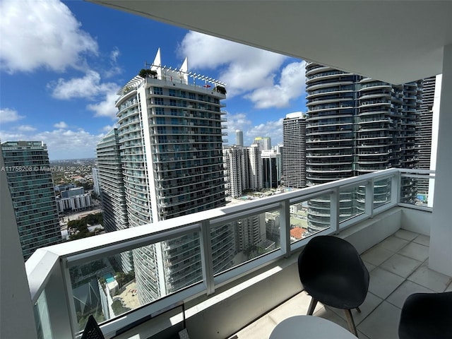 balcony featuring a city view