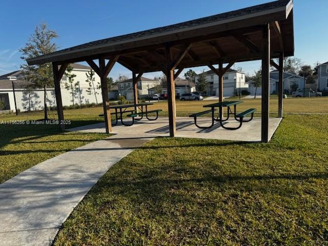 view of community with a yard and a gazebo