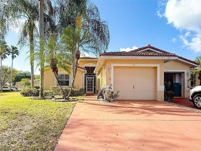139 Sausalito Dr, Boynton Beach, FL 33436 - mediterranean / spanish-style house with stucco siding, an attached garage, a front yard, driveway, and a tiled roof