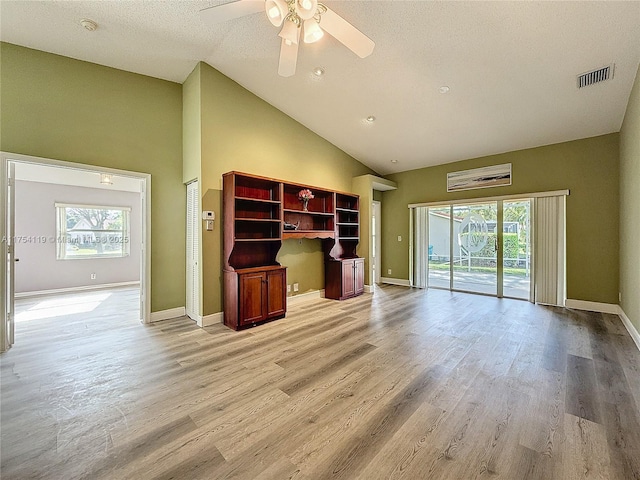 139 Sausalito Dr, Boynton Beach, FL 33436 - unfurnished living room with baseboards, plenty of natural light, visible vents, and light wood finished floors