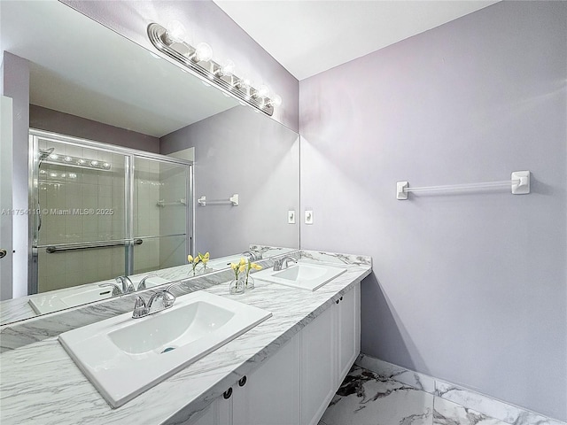 139 Sausalito Dr, Boynton Beach, FL 33436 - bathroom featuring marble finish floor, a sink, a shower stall, and double vanity