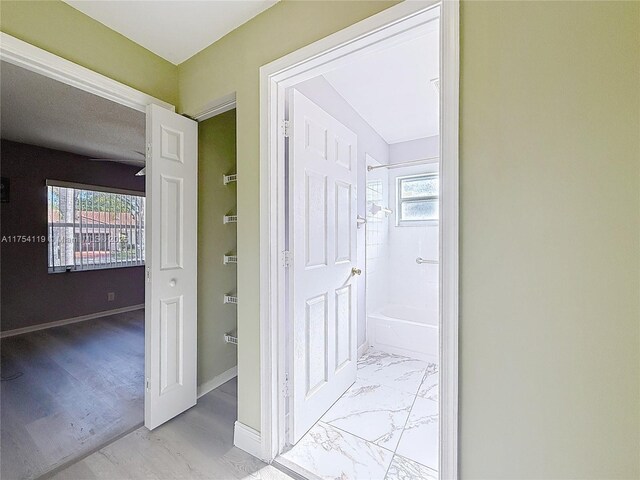 139 Sausalito Dr, Boynton Beach, FL 33436 - hall with marble finish floor and baseboards