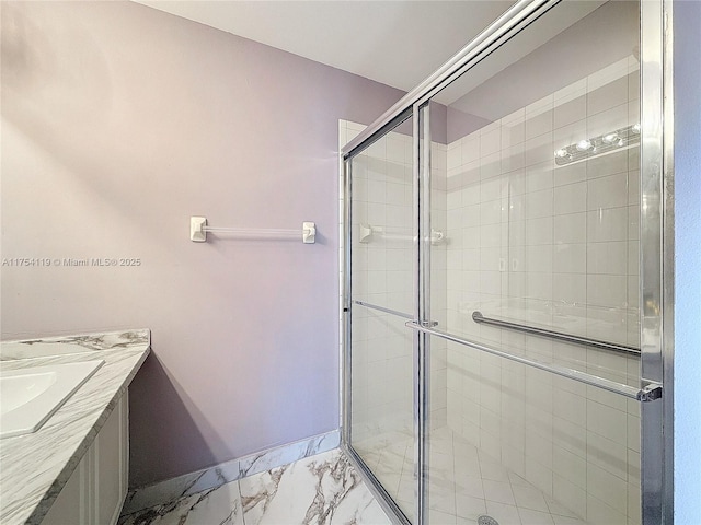139 Sausalito Dr, Boynton Beach, FL 33436 - full bathroom with marble finish floor, vanity, baseboards, and a stall shower