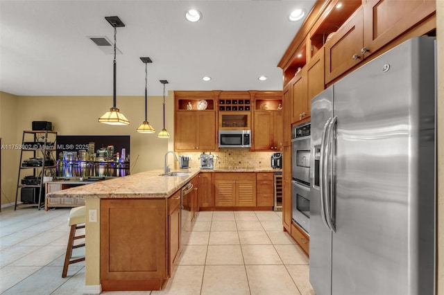 kitchen featuring appliances with stainless steel finishes, light tile patterned floors, a peninsula, and open shelves