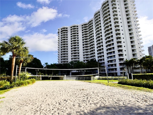 view of home's community featuring volleyball court