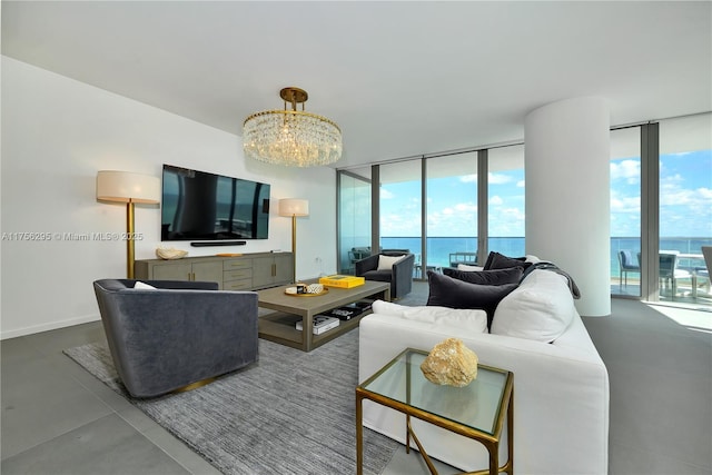 living area featuring expansive windows, baseboards, and an inviting chandelier