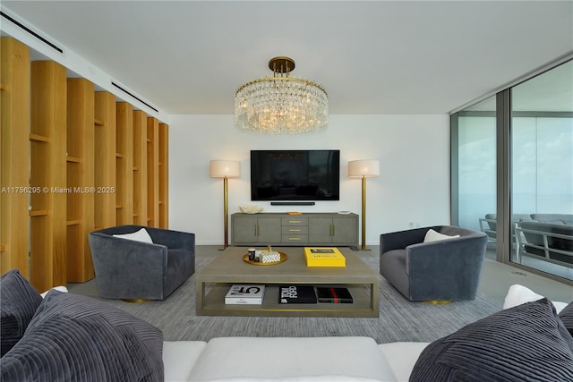 living area featuring a chandelier and floor to ceiling windows