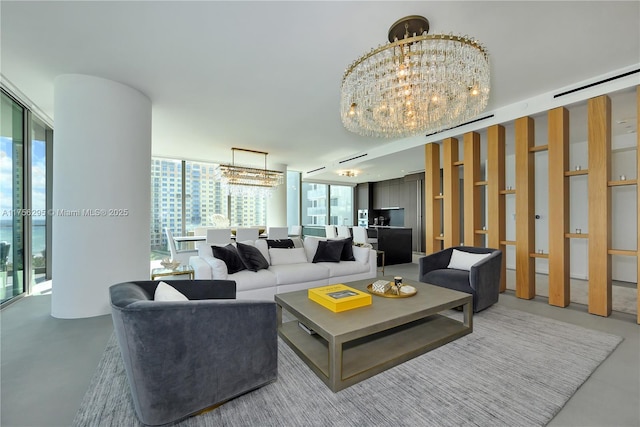 living room featuring a chandelier, floor to ceiling windows, and finished concrete flooring