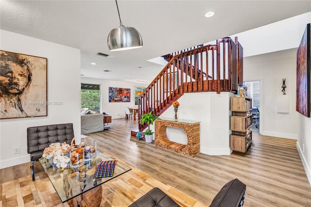4471 Foxtail Ln, Weston, FL 33331 - living area with stairway, wood finished floors, and recessed lighting