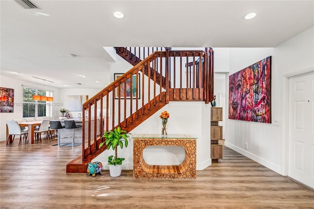 4471 Foxtail Ln, Weston, FL 33331 - staircase with wood finished floors and recessed lighting