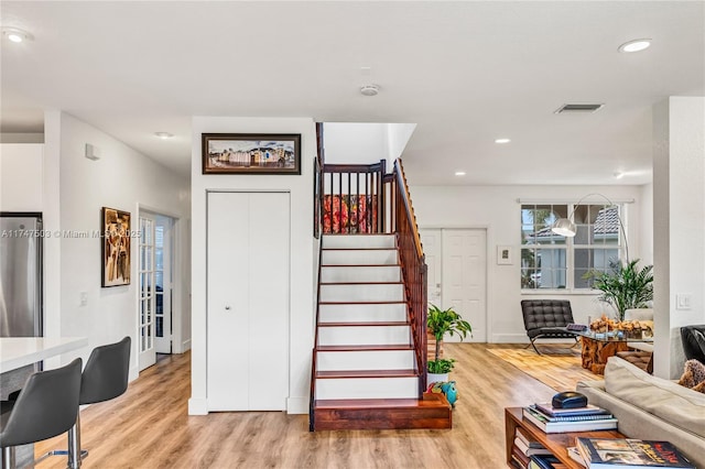 4471 Foxtail Ln, Weston, FL 33331 - living area with light wood-style floors, stairs, and recessed lighting