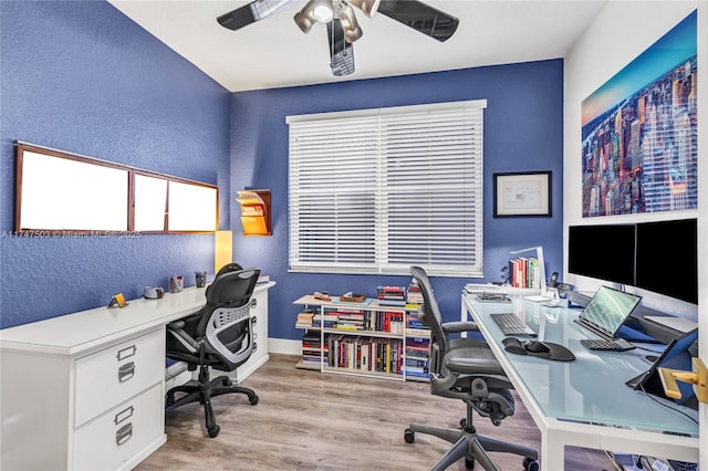 4471 Foxtail Ln, Weston, FL 33331 - home office featuring baseboards, wood finished floors, a ceiling fan, and a textured wall