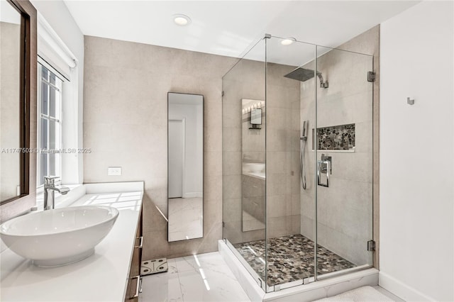 4471 Foxtail Ln, Weston, FL 33331 - bathroom with marble tiled floors, a stall shower, double vanity, and recessed lighting