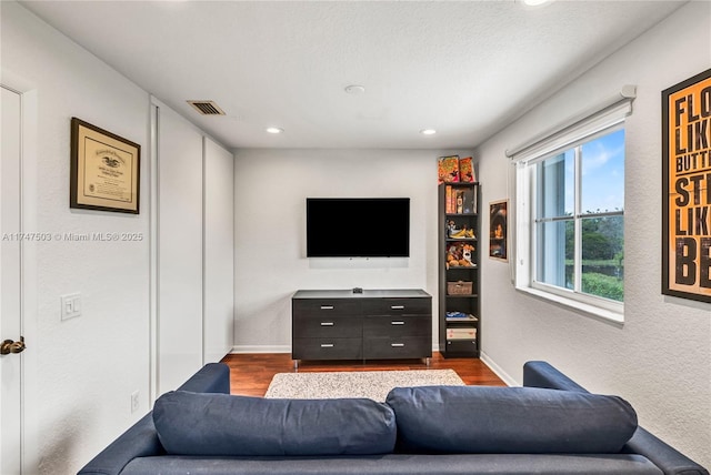 4471 Foxtail Ln, Weston, FL 33331 - living room featuring wood finished floors, recessed lighting, a textured wall, and baseboards