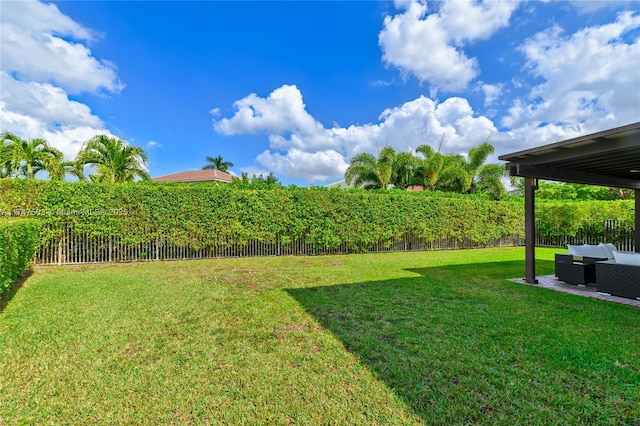 4471 Foxtail Ln, Weston, FL 33331 - fenced backyard featuring outdoor lounge area and a patio area