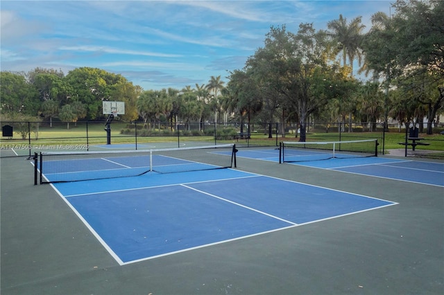 4471 Foxtail Ln, Weston, FL 33331 - view of tennis court featuring fence and view of wooded area