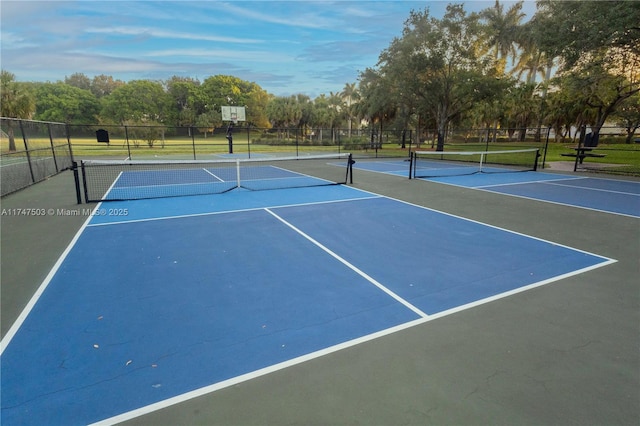 4471 Foxtail Ln, Weston, FL 33331 - view of tennis court featuring fence, community basketball court, and view of scattered trees