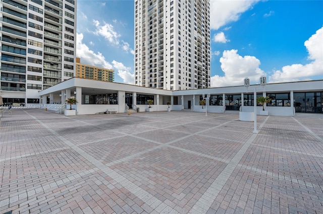 2301 S Ocean Dr Unit 1102, Hollywood, FL 33019 - view of building exterior with uncovered parking