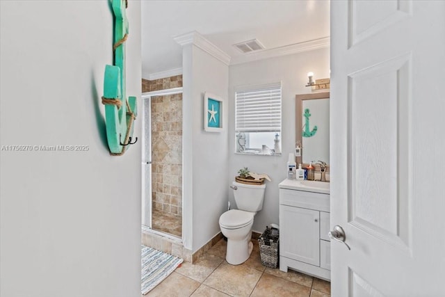 bathroom with a stall shower, visible vents, toilet, crown molding, and vanity