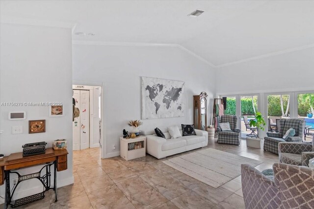 living room featuring high vaulted ceiling, visible vents, ornamental molding, and baseboards