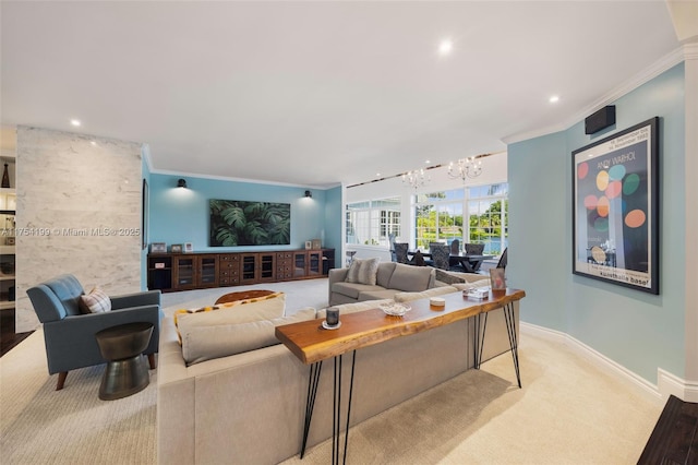 carpeted living room featuring baseboards, a chandelier, crown molding, and recessed lighting