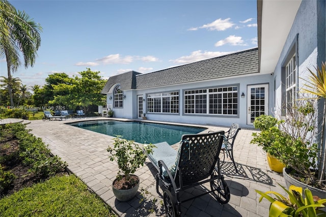 outdoor pool featuring a patio area