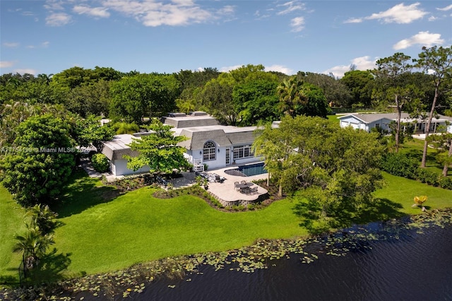 bird's eye view with a water view