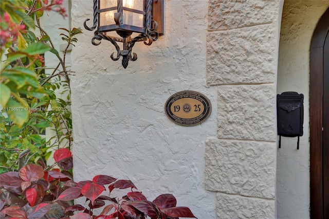 exterior details with arched walkways and stucco siding