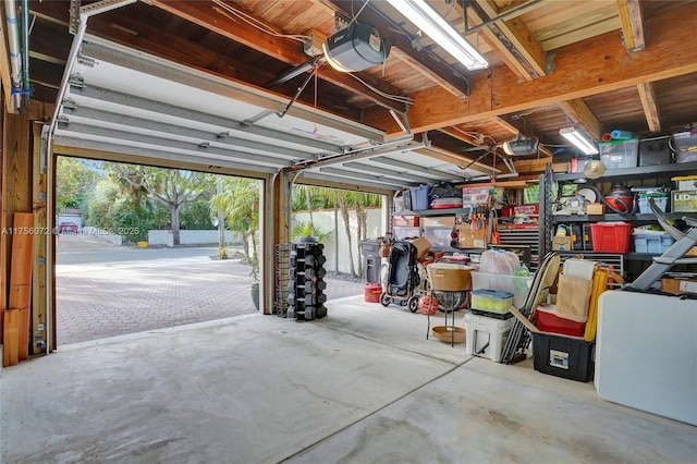 garage featuring a garage door opener