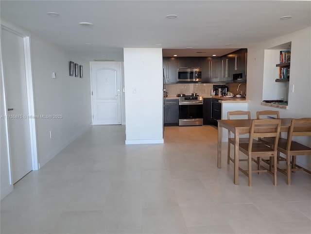 dining room featuring baseboards