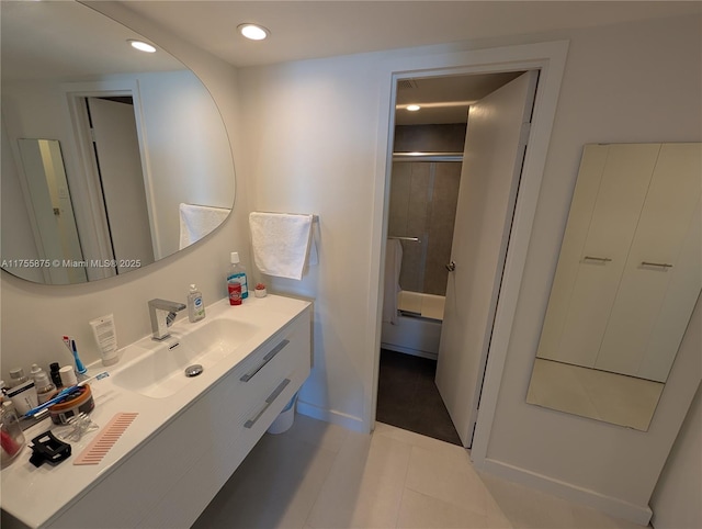 full bathroom featuring recessed lighting, tile patterned flooring, shower / bath combination with glass door, and vanity