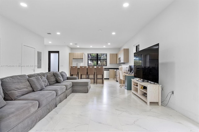 living room featuring marble finish floor, visible vents, and recessed lighting