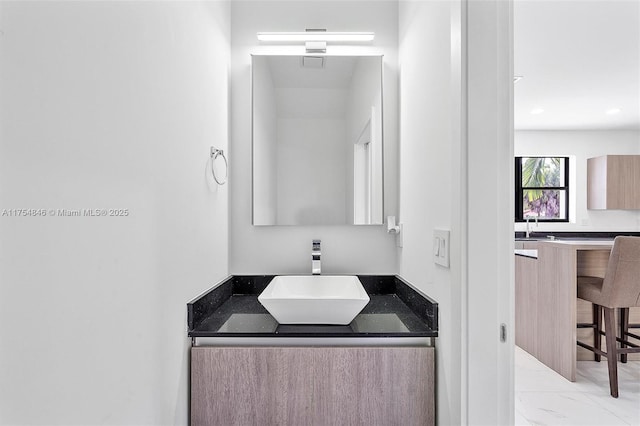 bathroom with visible vents, marble finish floor, vanity, and recessed lighting