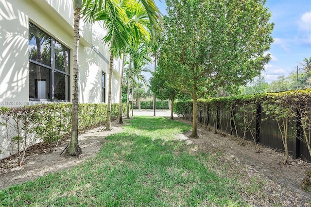 view of yard featuring fence