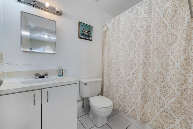 full bathroom with tile patterned flooring, a shower with curtain, vanity, and toilet