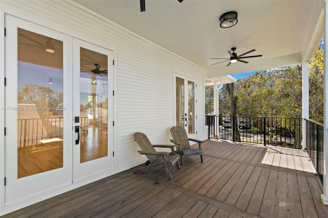 deck with ceiling fan and french doors