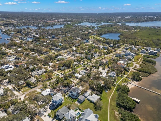 aerial view with a water view and a residential view