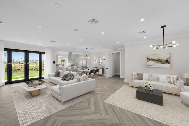 living area featuring visible vents, a chandelier, and recessed lighting