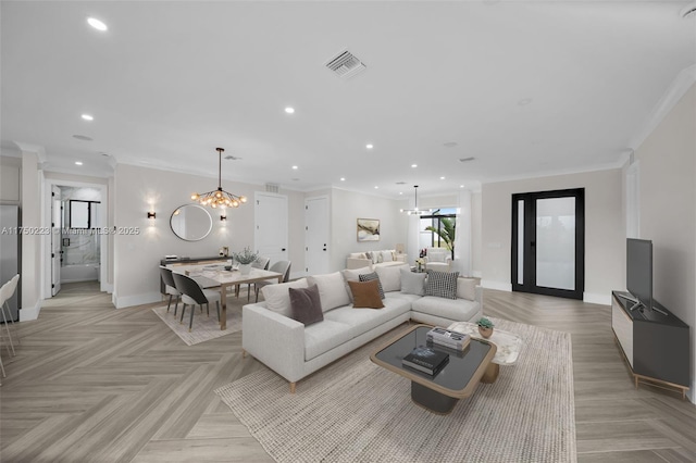 living area with ornamental molding, recessed lighting, visible vents, and a notable chandelier