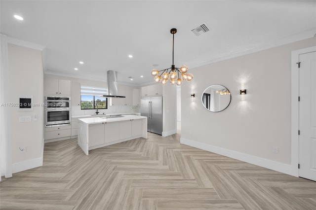 kitchen with exhaust hood, visible vents, baseboards, light countertops, and appliances with stainless steel finishes