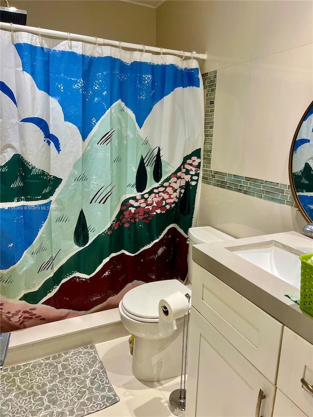 full bath featuring a shower with curtain, vanity, toilet, and tile patterned floors