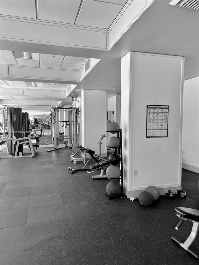 exercise room with baseboards