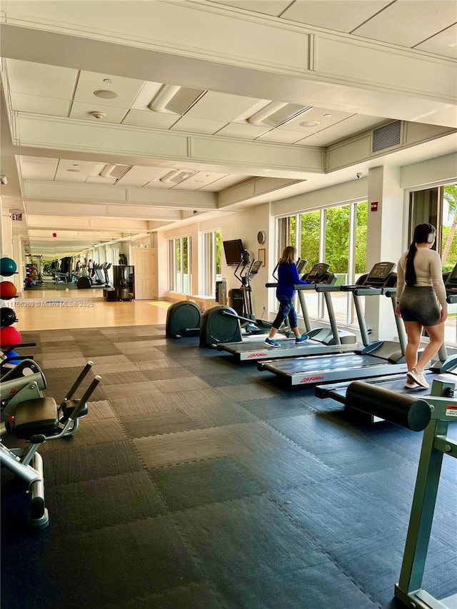 exercise room with carpet floors