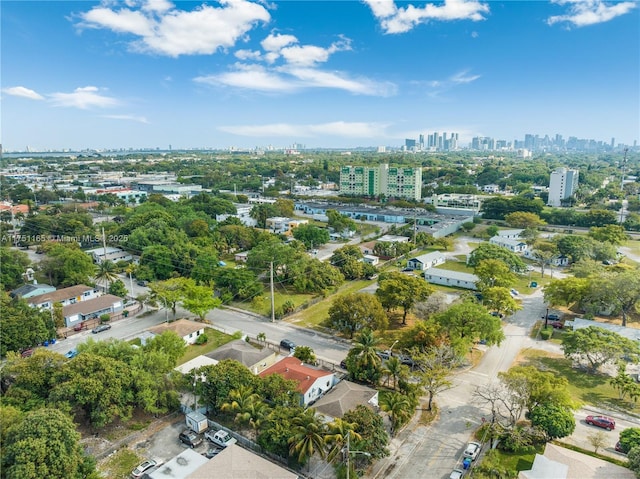 birds eye view of property with a view of city