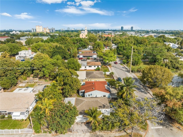 birds eye view of property featuring a city view