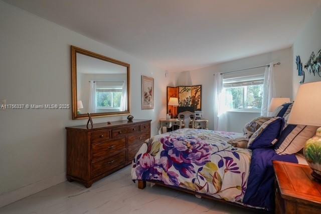 bedroom with baseboards