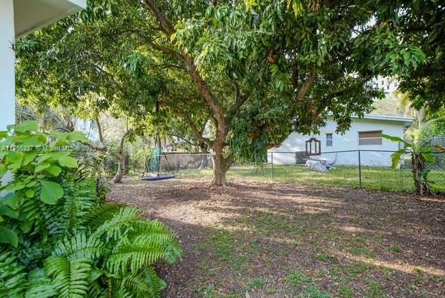 view of yard with fence