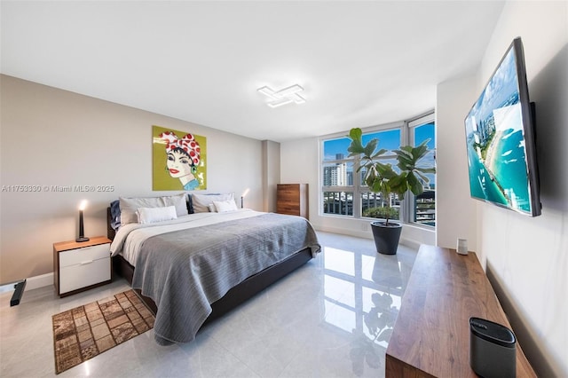 tiled bedroom with baseboards