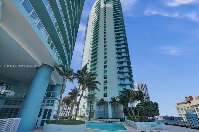 view of building exterior featuring a city view