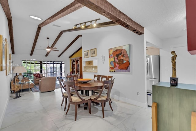 dining room featuring visible vents, marble finish floor, a textured ceiling, baseboards, and vaulted ceiling with beams